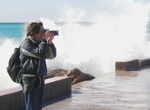 Fotograf in der Meeresbrandung